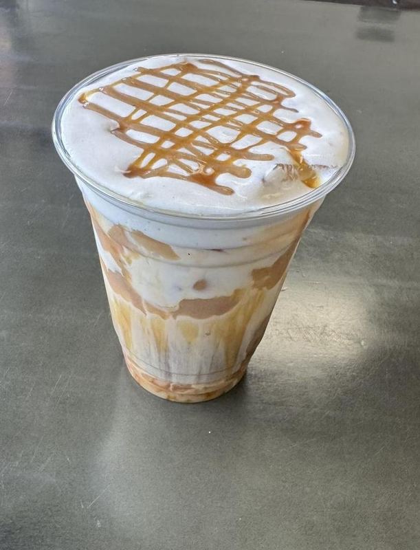 APEX Latte, an iced caramel-banana latte with a caramel drizzle lattice on top